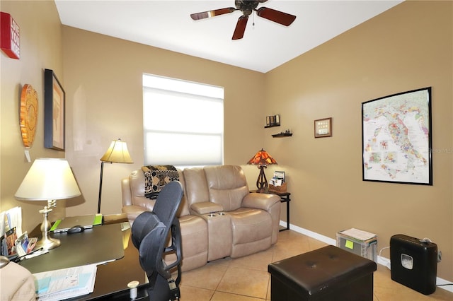 office space featuring ceiling fan and light tile patterned floors