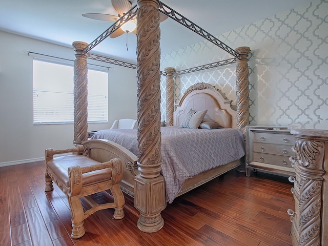 bedroom featuring dark hardwood / wood-style flooring and ceiling fan