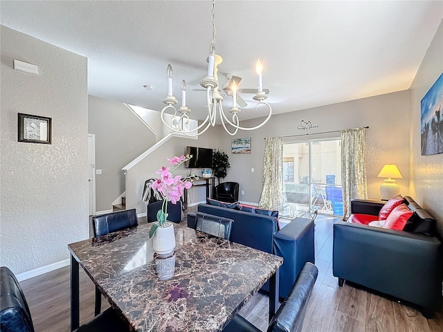 dining room with a chandelier and hardwood / wood-style flooring