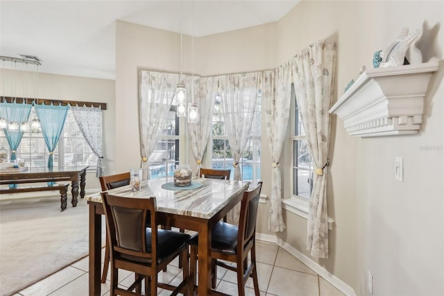 view of carpeted dining area