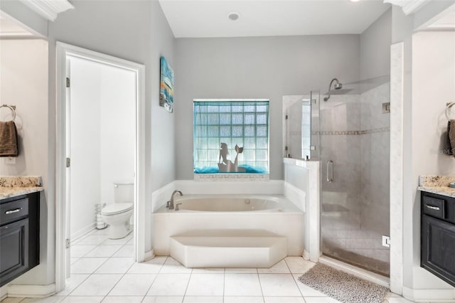 full bathroom featuring tile patterned floors, vanity, toilet, and shower with separate bathtub