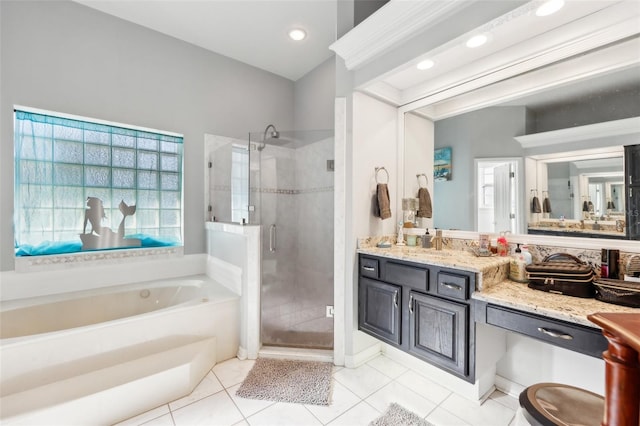 bathroom featuring separate shower and tub, tile patterned flooring, and vanity