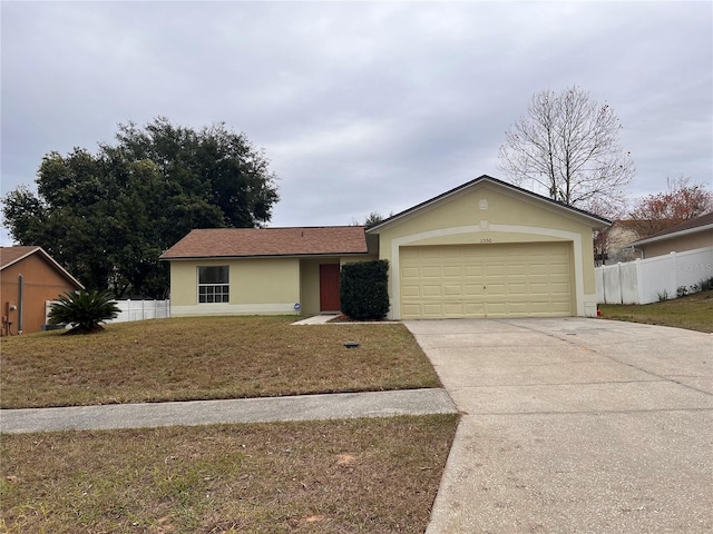 single story home featuring a garage and a front yard