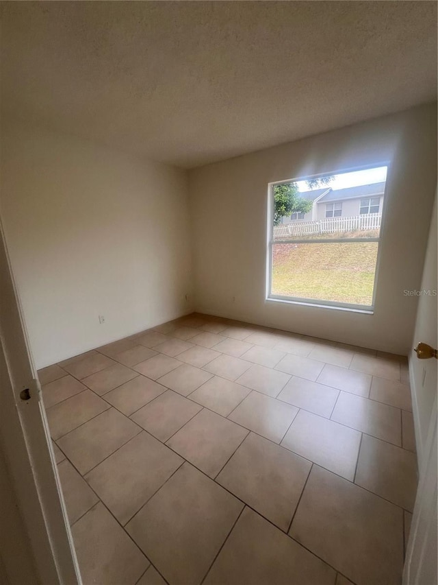 view of tiled empty room