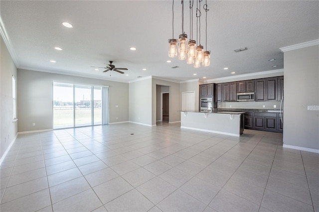 unfurnished living room with ceiling fan, light tile patterned floors, and ornamental molding