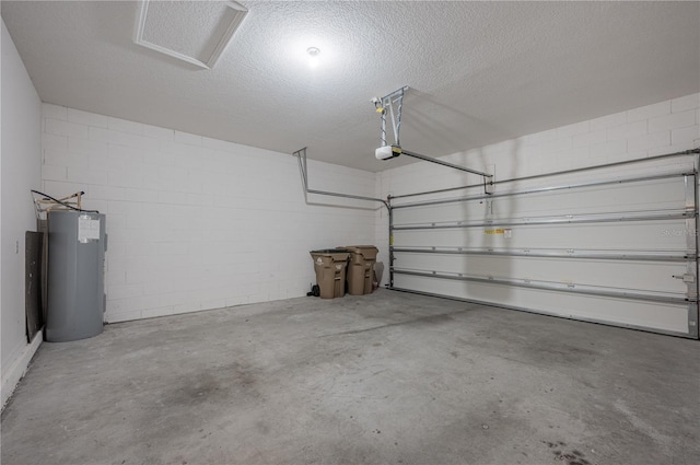 garage with electric water heater and a garage door opener