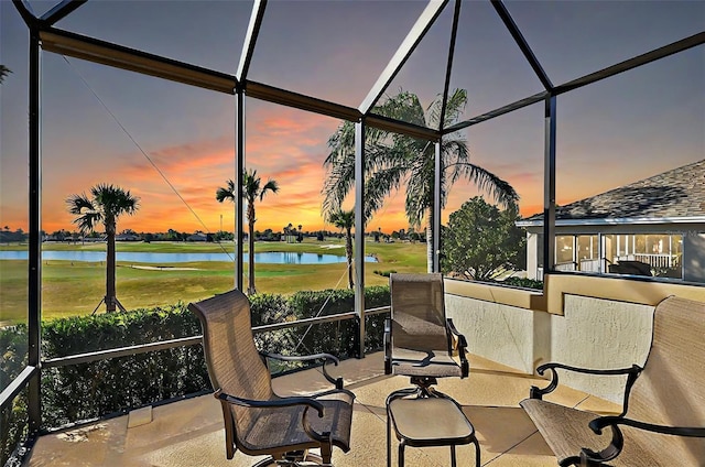 sunroom with a water view