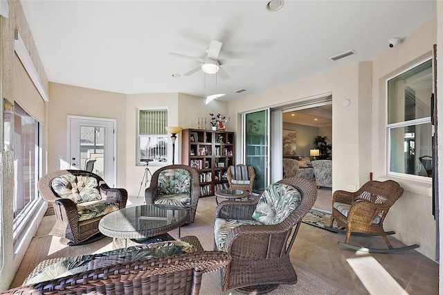 living room featuring ceiling fan