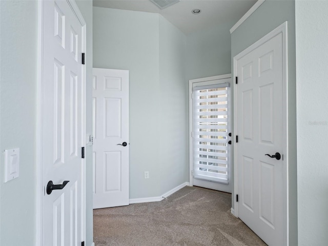 unfurnished bedroom with light colored carpet