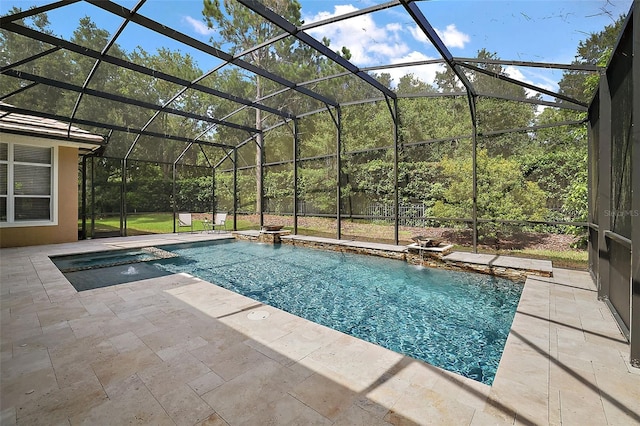 view of swimming pool featuring a lanai, a patio area, and pool water feature