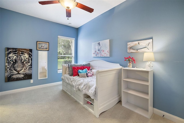 carpeted bedroom with ceiling fan