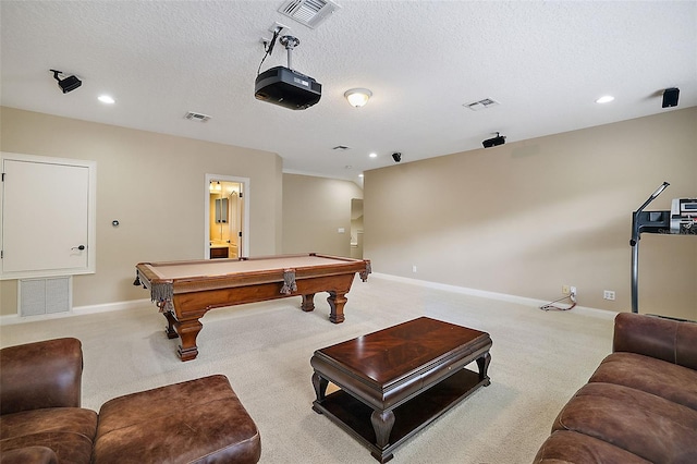 rec room with light carpet, a textured ceiling, and billiards