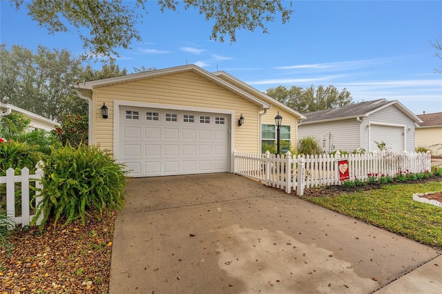 ranch-style home with a garage