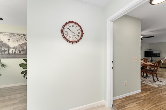 hall with light hardwood / wood-style floors