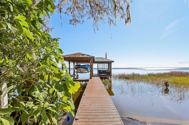 dock area featuring a water view