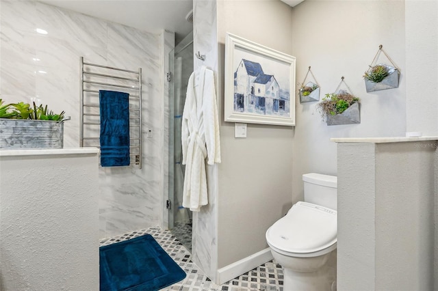 bathroom featuring a shower and toilet