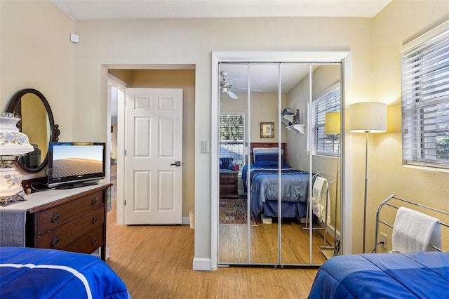 bedroom featuring a closet and light hardwood / wood-style floors