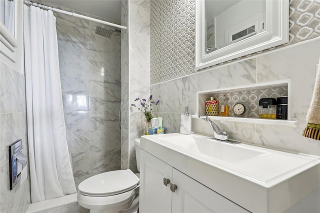 bathroom with vanity, curtained shower, toilet, and tile walls