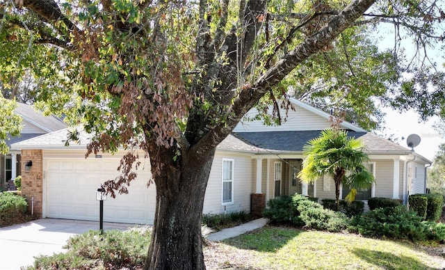 obstructed view of property featuring a garage