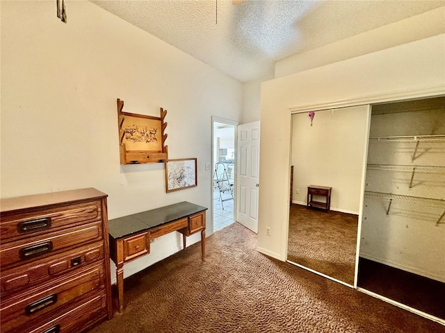 interior space featuring a closet and a textured ceiling