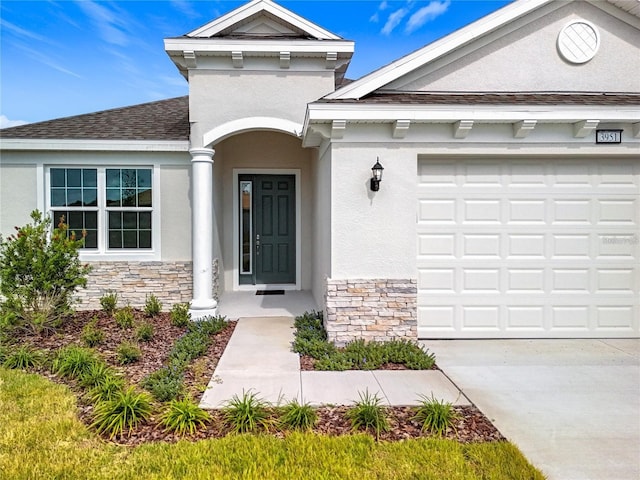 view of front of property featuring a garage