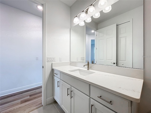 bathroom with vanity and tile patterned floors