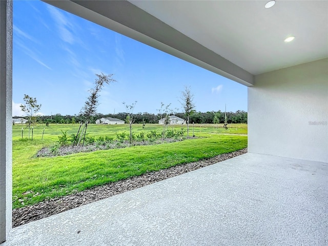 view of patio with a rural view