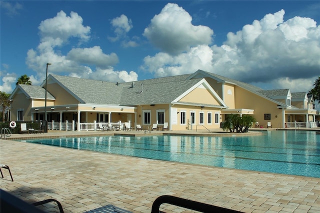 view of swimming pool featuring a patio area