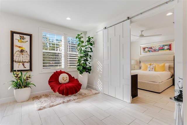 interior space with ceiling fan