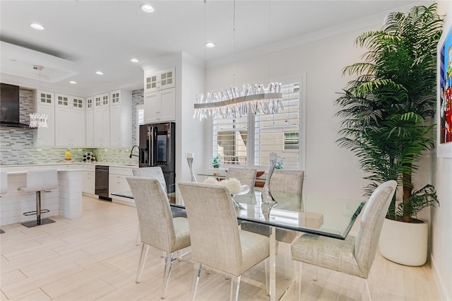 dining area featuring ornamental molding