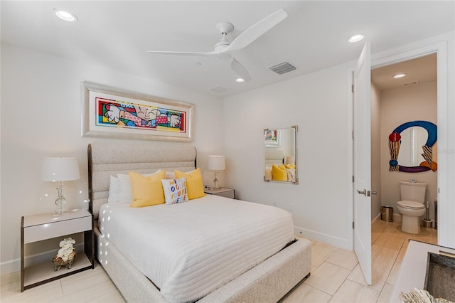 tiled bedroom featuring ceiling fan and connected bathroom