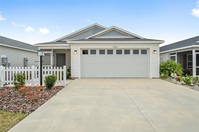 view of front of property featuring a garage