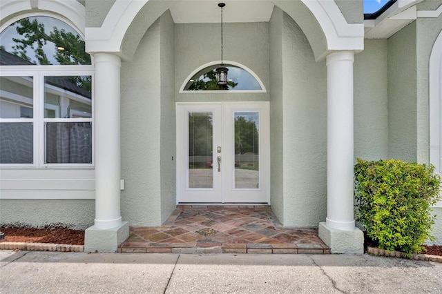 11941 Graces Way, Clermont, FL 34711 - entrance to property featuring french doors and stucco siding