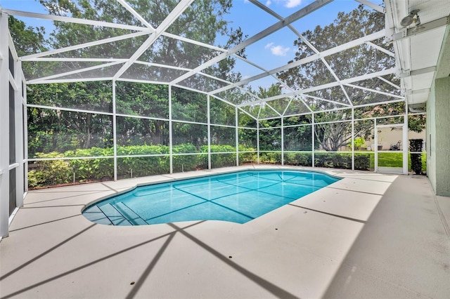 11941 Graces Way, Clermont, FL 34711 - outdoor pool featuring a patio area and glass enclosure