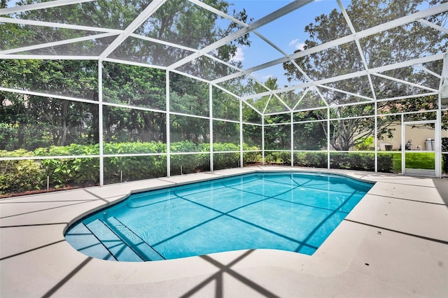 11941 Graces Way, Clermont, FL 34711 - swimming pool with a patio and a lanai