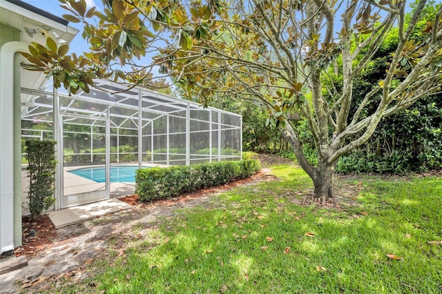 11941 Graces Way, Clermont, FL 34711 - view of green lawn with an outdoor pool