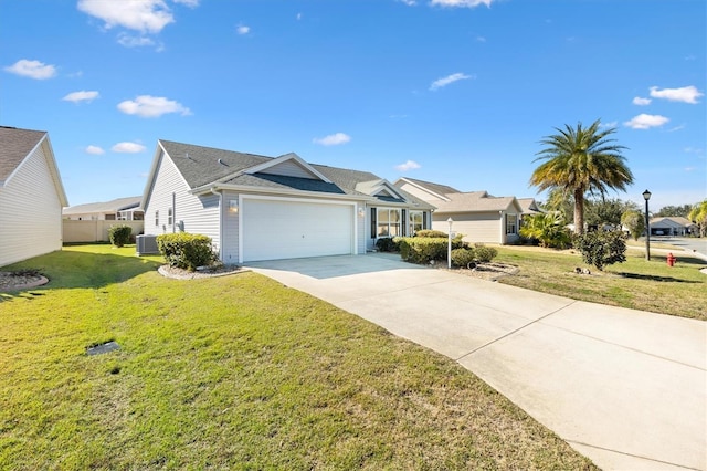 ranch-style home featuring a garage, a front yard, and central AC