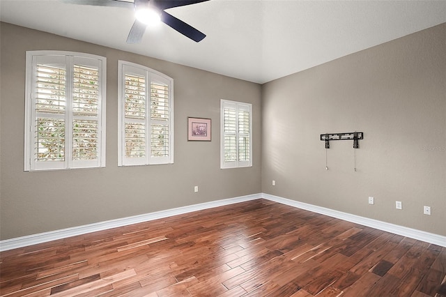 unfurnished room featuring ceiling fan and hardwood / wood-style floors