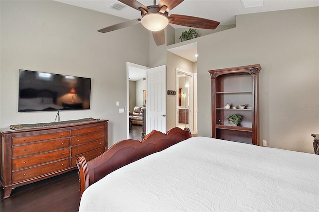 bedroom featuring dark wood-type flooring, high vaulted ceiling, ceiling fan, and connected bathroom