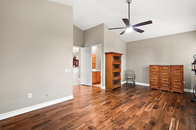 interior space featuring ceiling fan, dark hardwood / wood-style flooring, and high vaulted ceiling