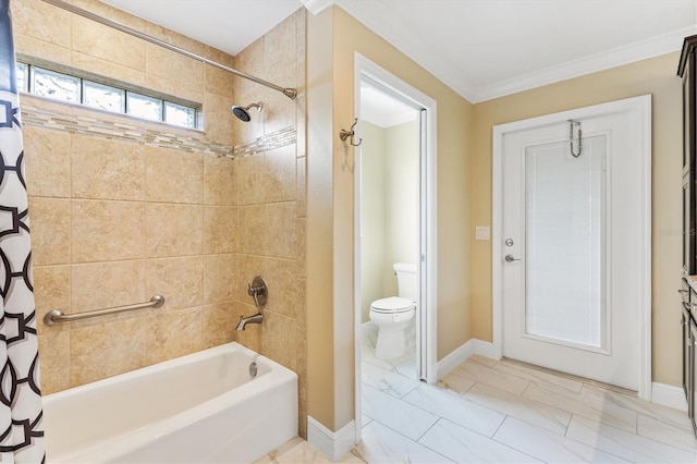 bathroom featuring ornamental molding, shower / bath combination with curtain, and toilet