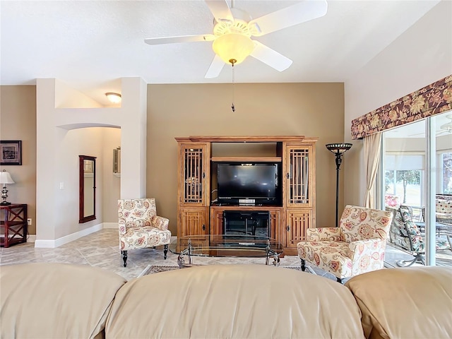 tiled bedroom with ceiling fan