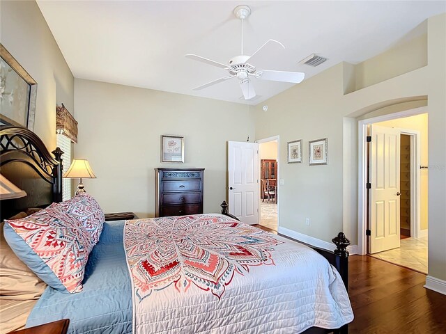 bedroom featuring hardwood / wood-style flooring and ceiling fan