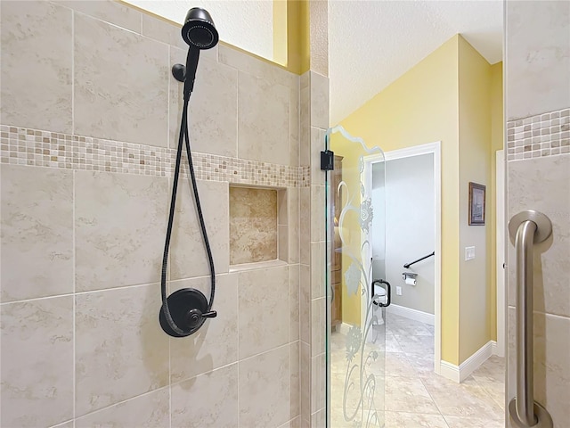 bathroom featuring an enclosed shower