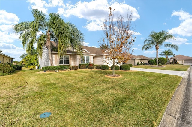 single story home with a front lawn