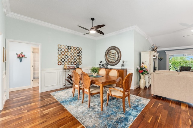 dining room with dark hardwood / wood-style floors, ceiling fan, and ornamental molding