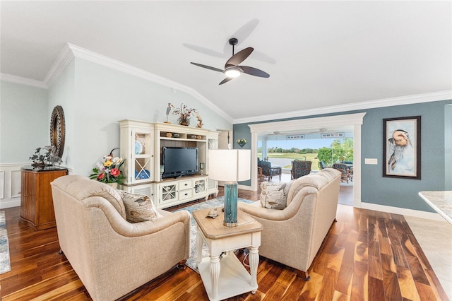 living room featuring hardwood / wood-style flooring, vaulted ceiling, ceiling fan, and crown molding