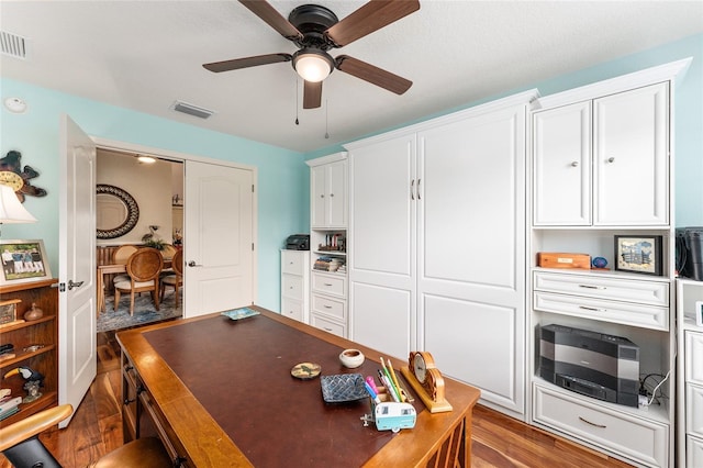 office space featuring light hardwood / wood-style floors and ceiling fan