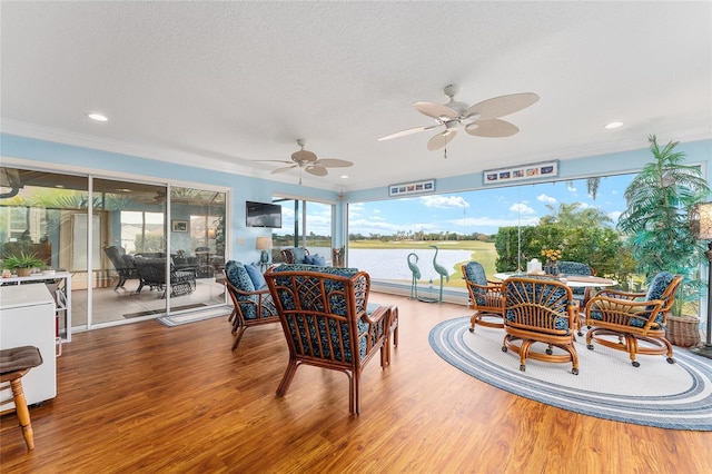 interior space featuring a wealth of natural light and ceiling fan