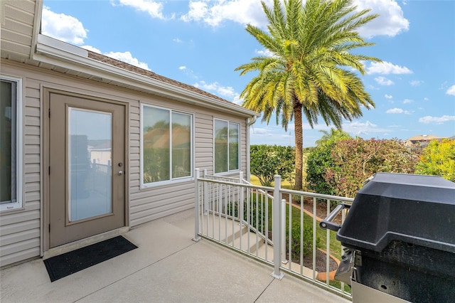 balcony featuring area for grilling